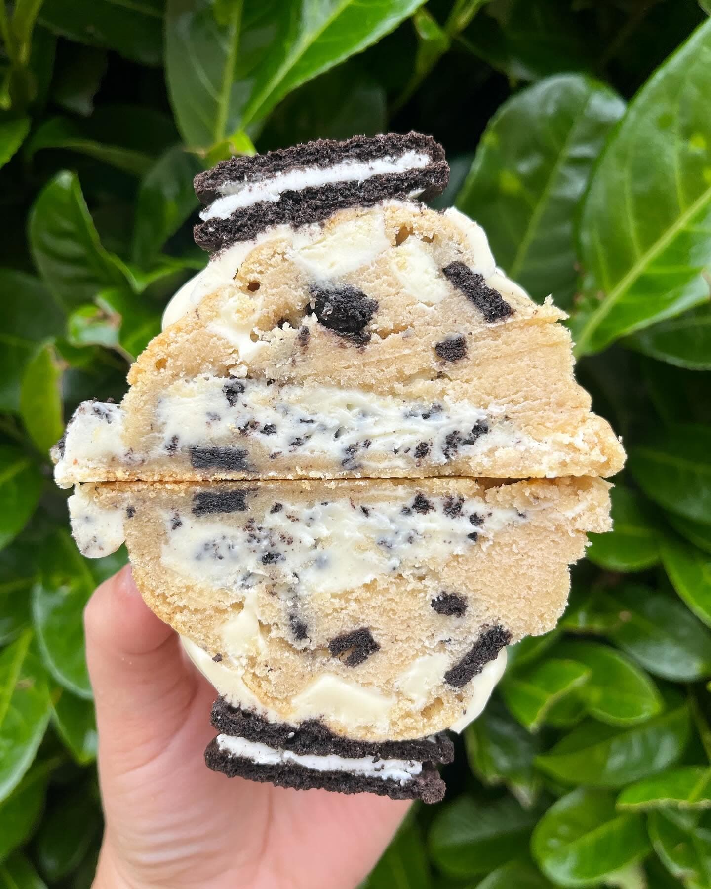 Oreo deluxe stuffed cookie cut open with cookies and cream filling