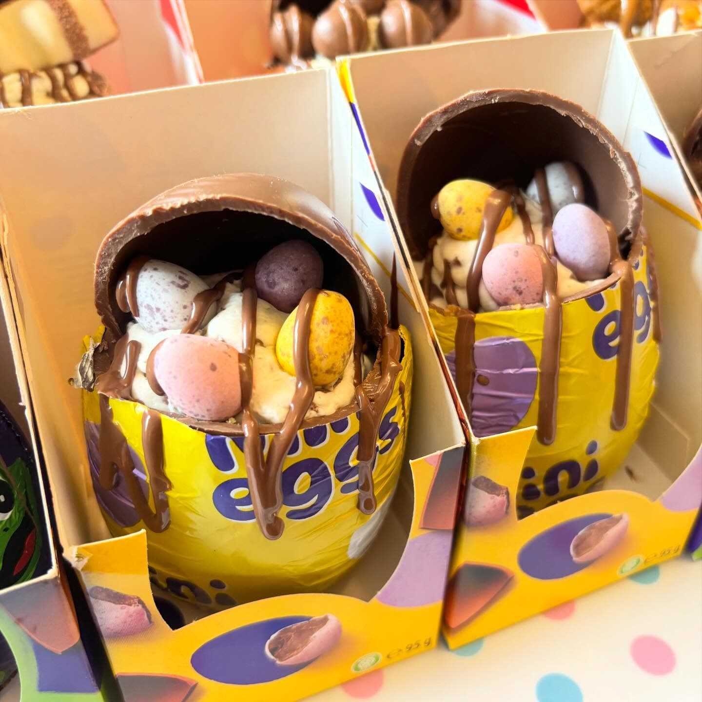 Filled Easter egg topped with Mini Eggs