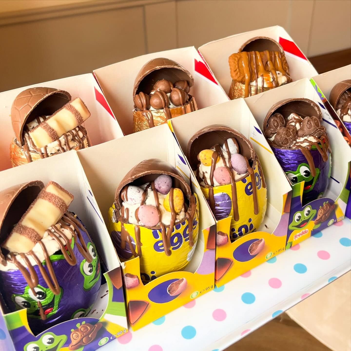 Assorted filled Easter eggs with chocolate toppings