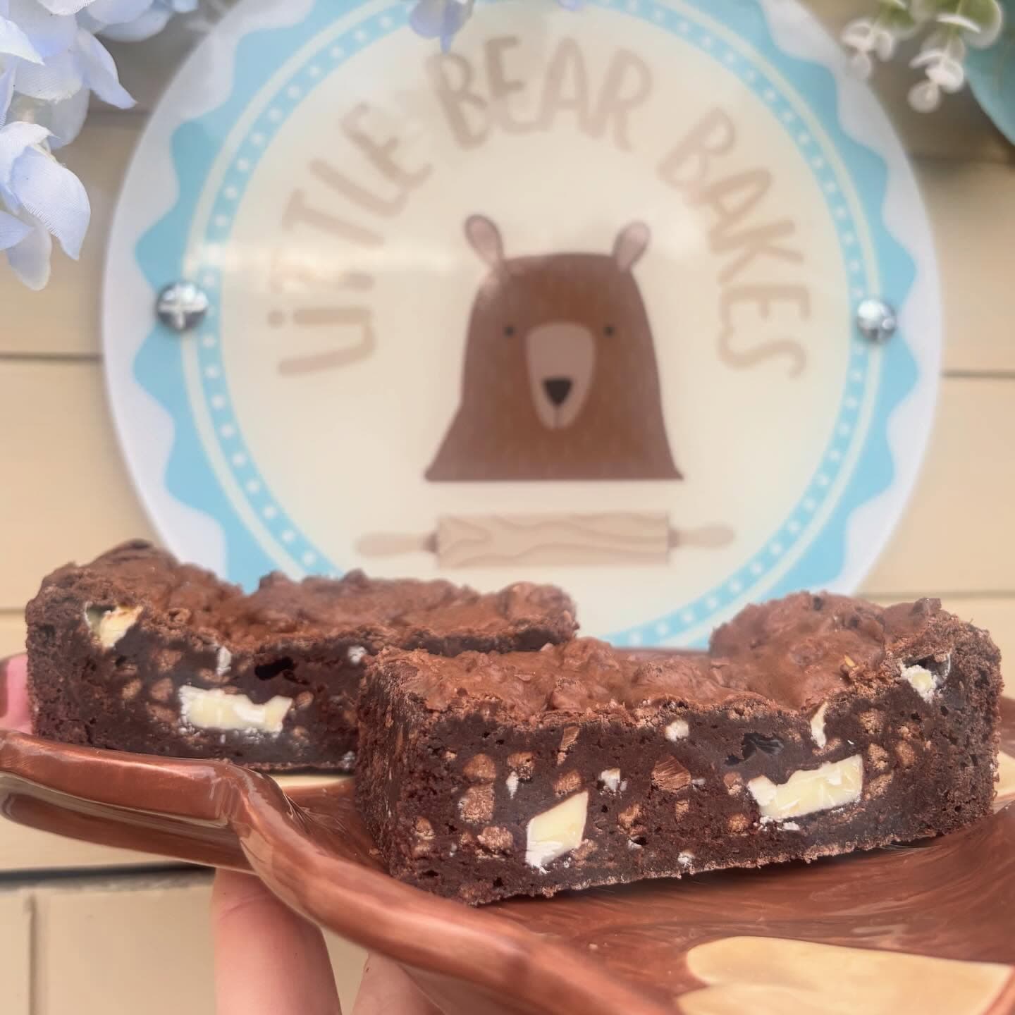 Triple chocolate brownie slices on a Little Bear Bakes plate