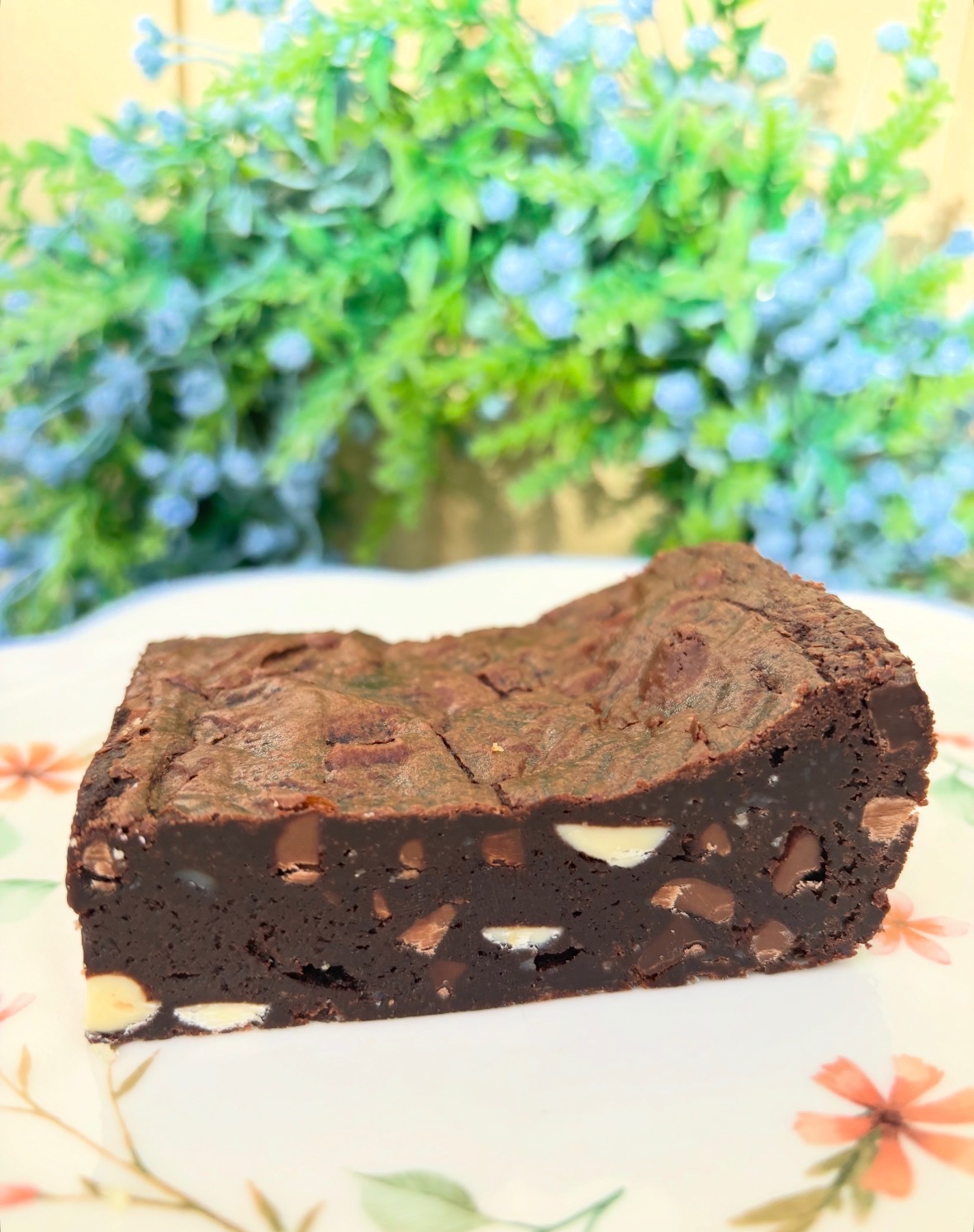 Triple chocolate brownie slices on a Little Bear Bakes plate